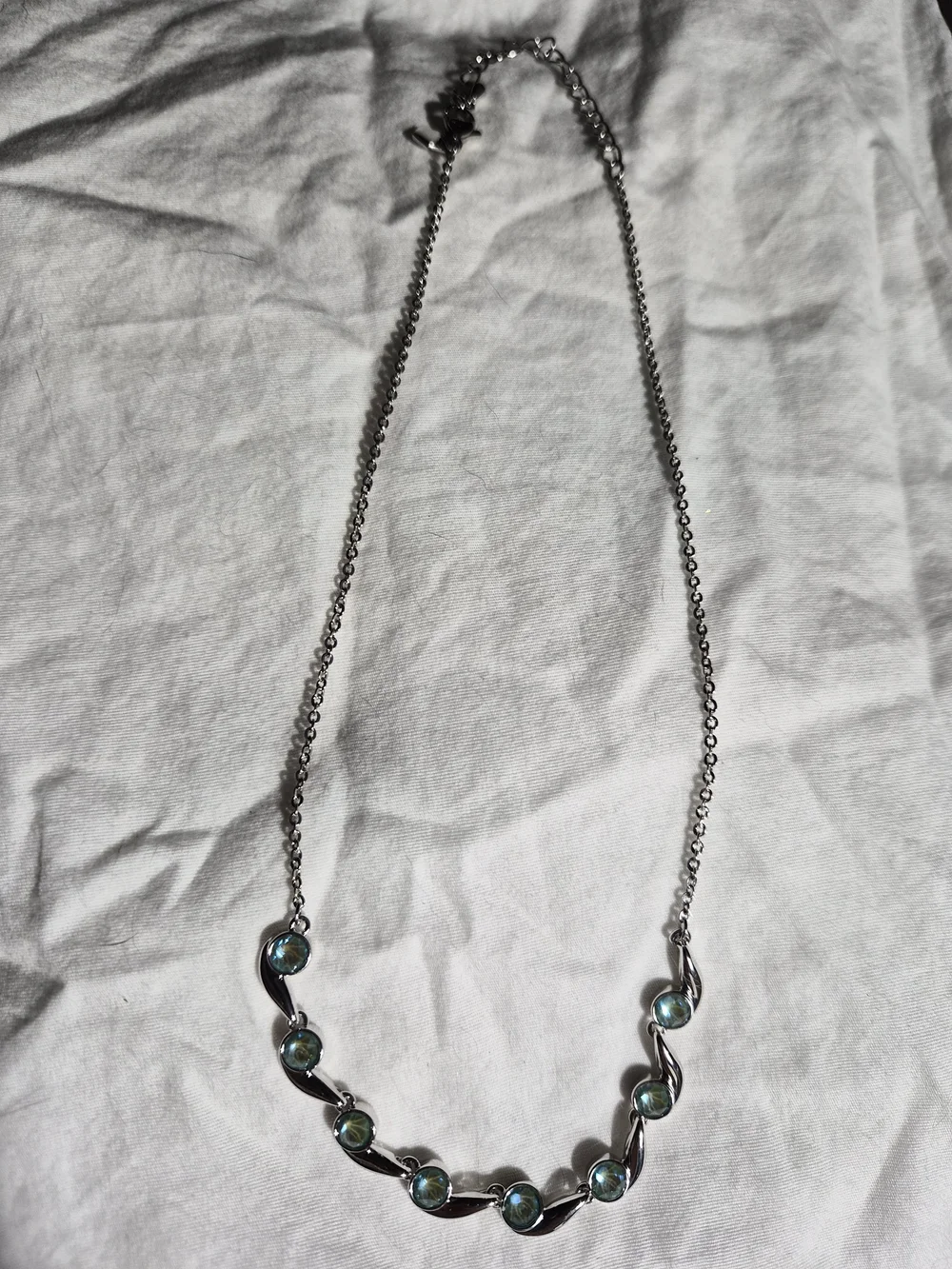 Touchstone Crystal Silver Necklace with Teal Gem Accents
